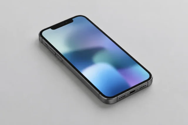 iPhone на светло-сером фоне как пример смартфона для темы резервного копирования